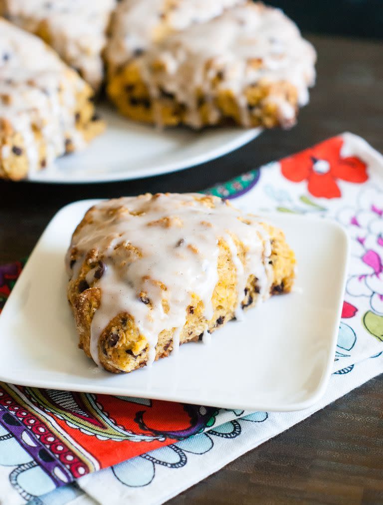 <p>Dry scones, be gone! These thick, cake-like treats are made with creamy pumpkin, warm spices, mini chocolate chips and topped with a sweet cinnamon glaze.</p><p><em><a href="https://www.thepioneerwoman.com/food-cooking/recipes/a79833/pumpkin-spice-chocolate-chip-scones/" rel="nofollow noopener" target="_blank" data-ylk="slk:Get the recipe from The Pioneer Woman »;elm:context_link;itc:0;sec:content-canvas" class="link ">Get the recipe from The Pioneer Woman »</a></em></p>