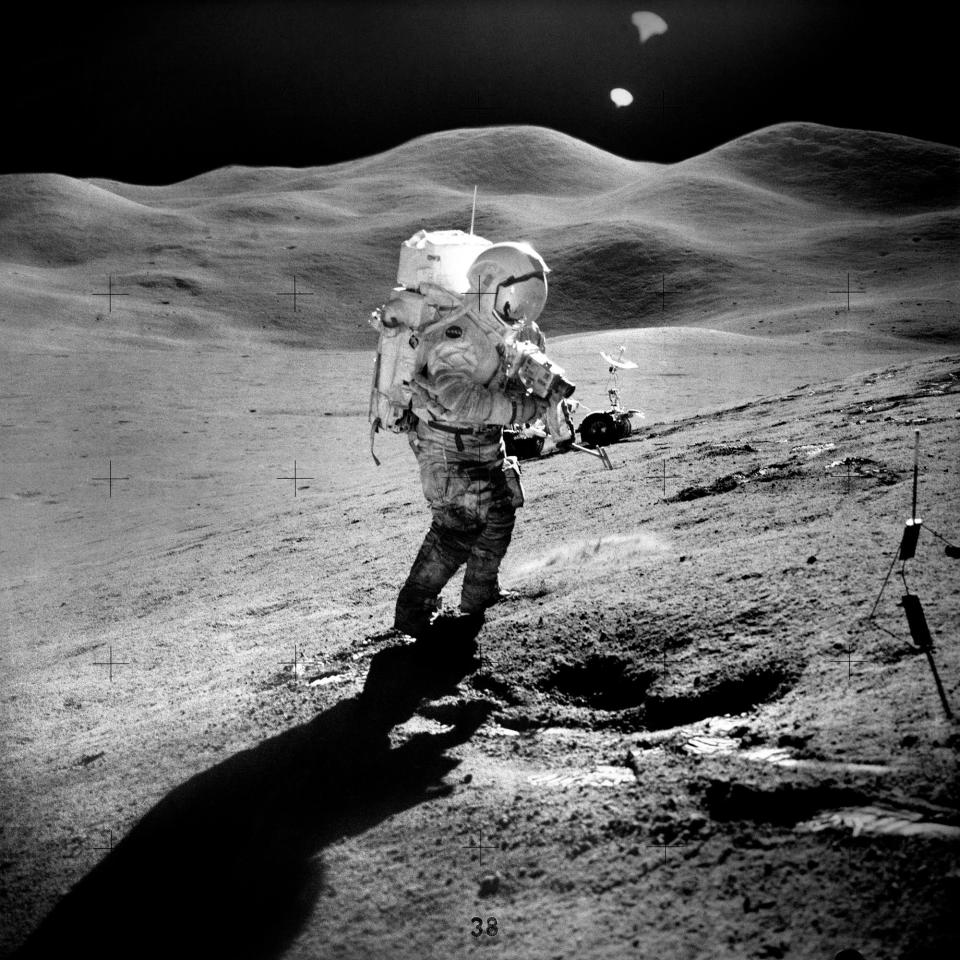 Scientific collection on the moon during the Apollo 15 mission.