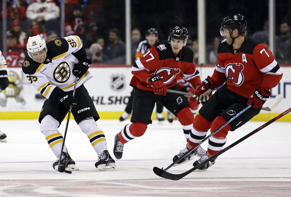 FILE - Boston Bruins' Vinni Lettieri (95) shoots against the New Jersey Devils during the second period of an NHL preseason hockey game Oct. 3, 2022, in Newark, N.J. The Minnesota Wild signed Lettieri to a two-year, two-way contract. The deal brings the grandson of hockey great Lou Nanne back to his home state. The 28-year-old Lettieri will make $750,000 in the NHL and $550,000 in the AHL. He spent most of last season with Boston’s minor-league affiliate. He had 23 goals and 26 assists in 48 games for Providence. (AP Photo/Adam Hunger, File)