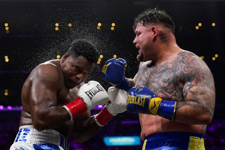 Ruiz Jr (right) dropped Ortiz twice but could not put the 43-year-old away (AP)