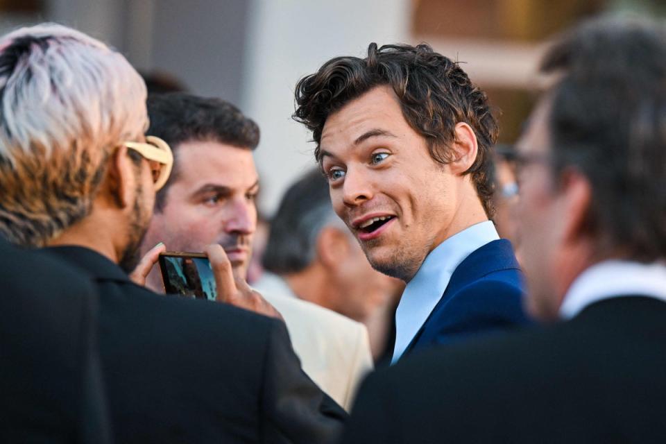 British singer and actor Harry Styles arrives on September 5, 2022 for the screening of the film “Don’t Worry Darling” (AFP via Getty Images)