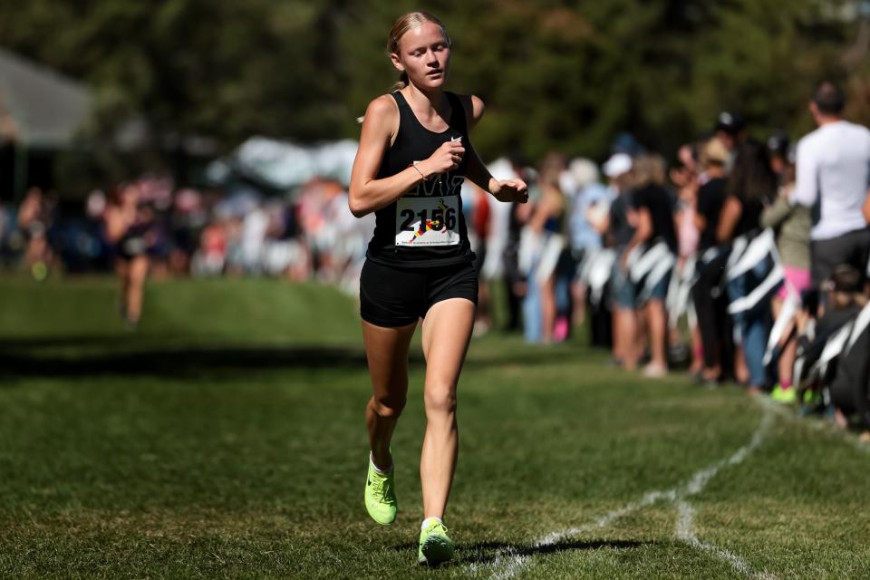 Julie Moore of Mountain View places third in the championship girls race at the Border Wars XC meet at Sugar House Park in Salt Lake City on Saturday, Sept. 16, 2023. | Spenser Heaps, Deseret News