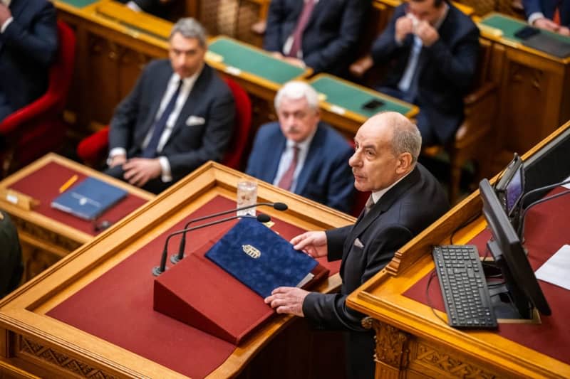 Newly elected Hungarian President Tamas Sulyok speaks after being sworn in after representatives of the Hungarian parliament confirmed his appointment as the new president, at the parliament building in Budapest. Marton Monus/dpa