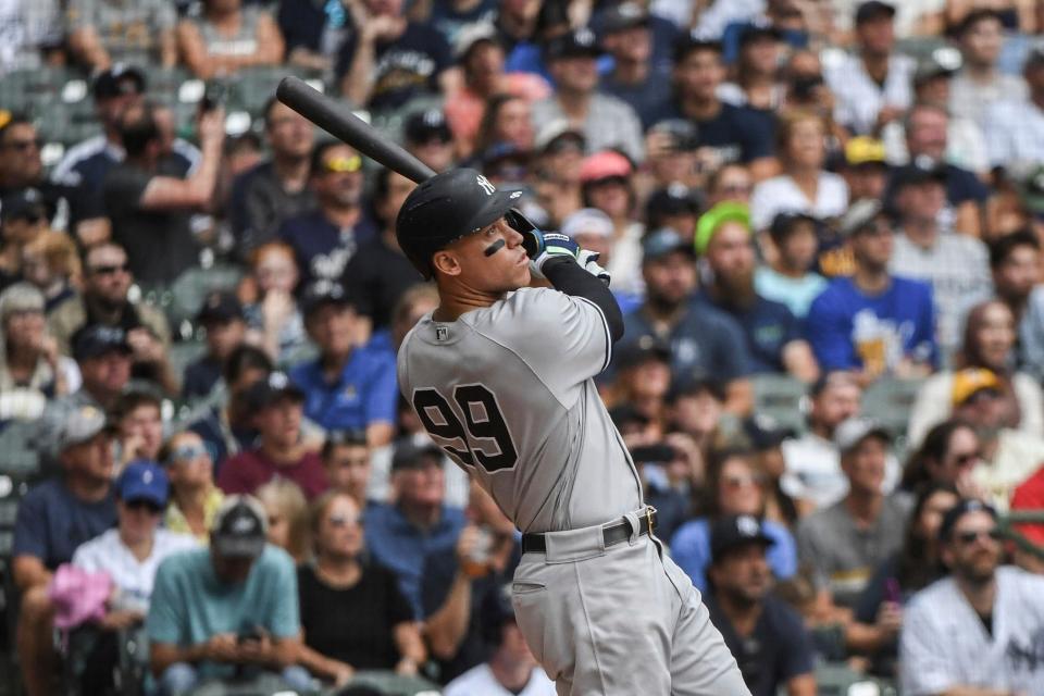 The New York Yankees' Aaron Judge hits his 58th home run of the season during the third inning of the Yankees' game against the Milwaukee Brewers on Sunday, Sept. 18, 2022, in Milwaukee.