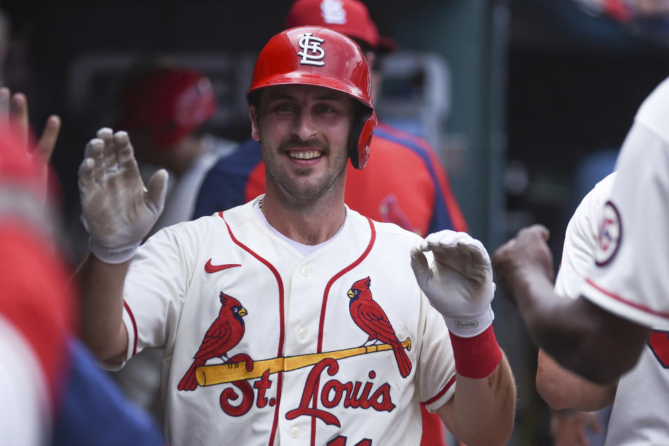 St. Louis Cardinals' Paul DeJong is congratulated by teammates after hitting a home run during the second inning of a baseball game against the Pittsburgh Pirates Saturday, June 26, 2021, in St. Louis. (AP Photo/Joe Puetz)