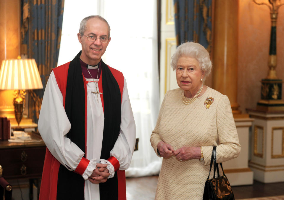 Justin Welby, archbishop of Canterbury, and Queen Elizabeth pose for a photo in February 2013.&nbsp; (Photo: POOL New / Reuters)