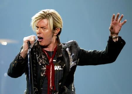David Bowie performs his North American debut of "A Reality Tour" in Montreal, December 13, 2003. REUTER/Shaun Best/File Photo