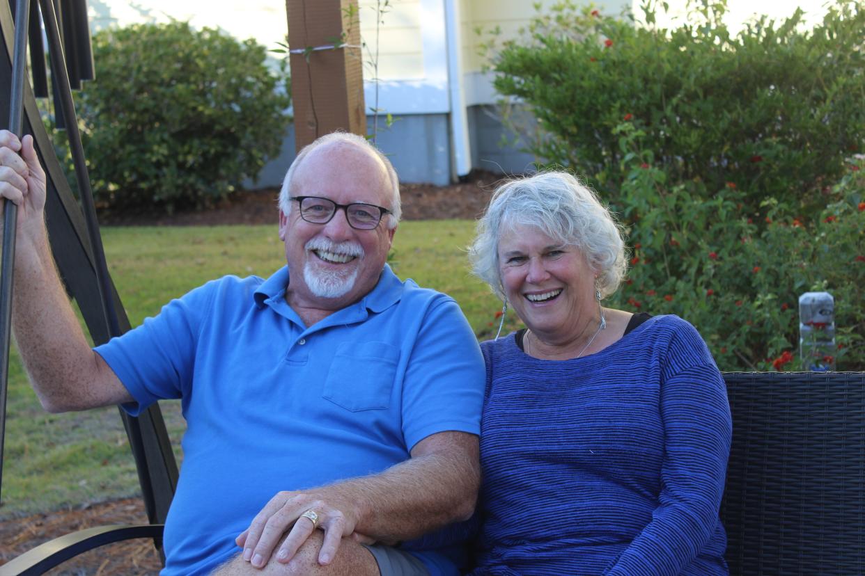 Dan and Nancy Barton enjoy the afternoon on the swing at their home in St. James on Monday, November 13, 2023. The couple moved to Brunswick County in March and say they are learning more about the area each day.