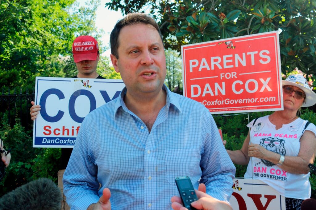 Del. Dan Cox, a Maryland state legislator who is seeking the Republican nomination for governor of Maryland, talks to reporters, in Annapolis, Md., Thursday, June 30, 2022. (AP Photo/Brian Witte)