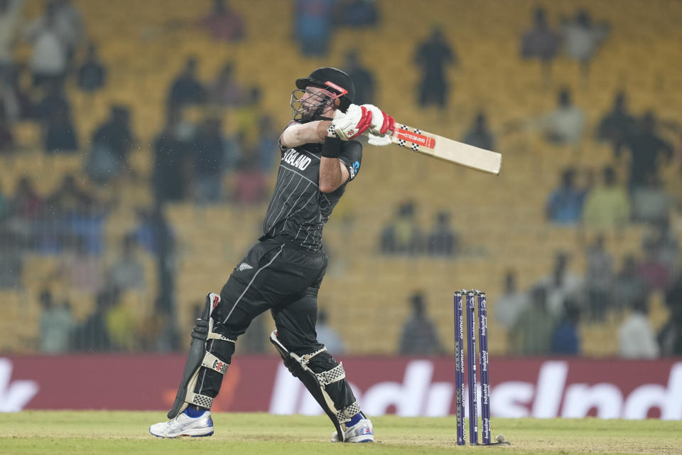 New Zealand's Daryl Mitchell plays a shot during the ICC Men's Cricket World Cup match between New Zealand and Bangladesh in Chennai , India, Friday, Oct. 13, 2023. (AP Photo/Eranga Jayawardena)