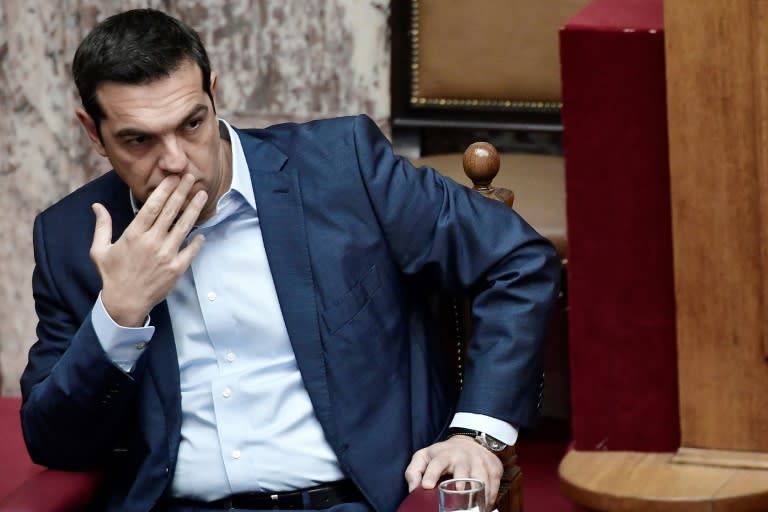 Some members of Alexis Tsipras' government have attended protests against a judicial decision to jail an alleged left-wing extremist