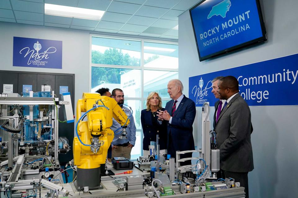 President Joe Biden speaks as he tours Nash Community College with first lady <span class="caas-xray-inline-tooltip"><span class="caas-xray-inline caas-xray-entity caas-xray-pill rapid-nonanchor-lt" data-entity-id="Jill_Biden" data-ylk="cid:Jill_Biden;pos:2;elmt:wiki;sec:pill-inline-entity;elm:pill-inline-text;itc:1;cat:OfficeHolder;" tabindex="0" aria-haspopup="dialog"><a href="https://search.yahoo.com/search?p=Jill%20Biden" data-i13n="cid:Jill_Biden;pos:2;elmt:wiki;sec:pill-inline-entity;elm:pill-inline-text;itc:1;cat:OfficeHolder;" tabindex="-1" data-ylk="slk:Jill Biden;cid:Jill_Biden;pos:2;elmt:wiki;sec:pill-inline-entity;elm:pill-inline-text;itc:1;cat:OfficeHolder;" class="link ">Jill Biden</a></span></span>, North Carolina Gov. Roy Cooper and Rep. Don Davis, D-N.C., in Rocky Mount, N.C., Friday, June 9, 2023.<span class="copyright">Susan Walsh—AP</span>