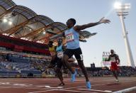 Athletics - Gold Coast 2018 Commonwealth Games - Men's 4x400m - Final - Carrara Stadium - Gold Coast, Australia - April 14, 2018. Isaac Makwala of Botswana celebrates. REUTERS/Paul Childs