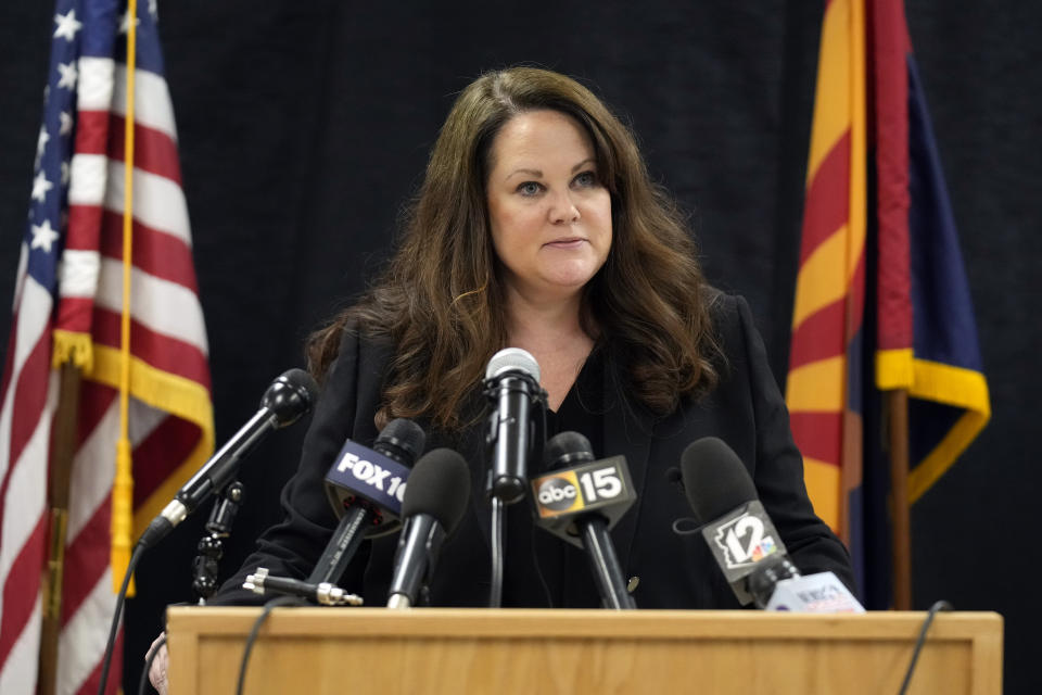 Chief Counsel, Arizona Voice For Crime Victims and Attorney for Leslie James, Colleen Chase talks to the media on Wednesday, May 11, 2022, in Florence, Ariz. Inmate Clarence Dixon was put to death by lethal injection earlier Wednesday inside the state prison for his murder conviction in the killing of 21-year-old Arizona State University student Deana Bowdoin in 1978. Dixon was the first person to be executed in the state after a nearly eight-year hiatus in its use of the death penalty. (AP Photo/Rick Scuteri)