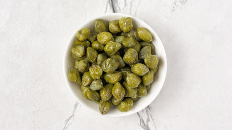 white bowl of capers