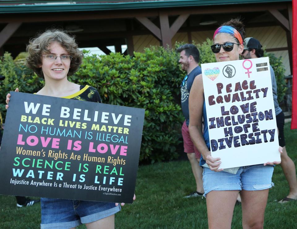 Hundreds rally in a show of support against hate on July 23, 2022, on Route 1 in Kittery, Maine, a week after a neo-Nazi group appeared in the same area.