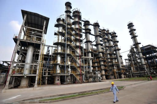 This file photo shows a Sinopec oil refinery in Wuhan, central China's Hubei province. China swung into a huge trade deficit of $31.48 billion in February as oil imports rocketed, according to the latest customs data