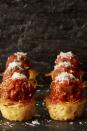 <p>Avoid an awkward <em>Lady and the Tramp </em>situation with these bite-size pasta nests. </p><p>Get the <a href="https://www.goodhousekeeping.com/food-recipes/party-ideas/a47539/spaghetti-and-meatball-nests-recipe/" rel="nofollow noopener" target="_blank" data-ylk="slk:Spaghetti Meatball Nests recipe" class="link "><strong>Spaghetti Meatball Nests recipe</strong></a>.</p>