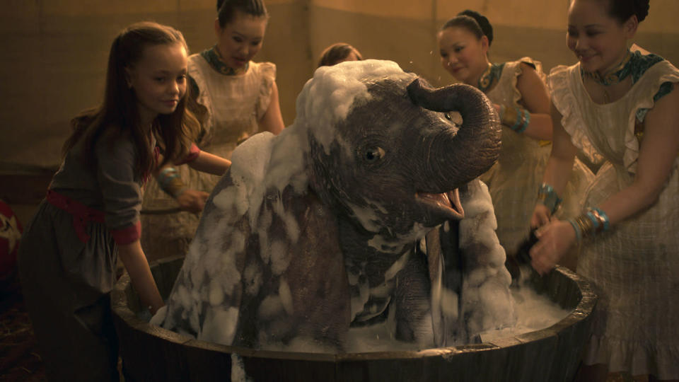 Dumbo takes a bath in this new still from Tim Burton’s film. (Disney)