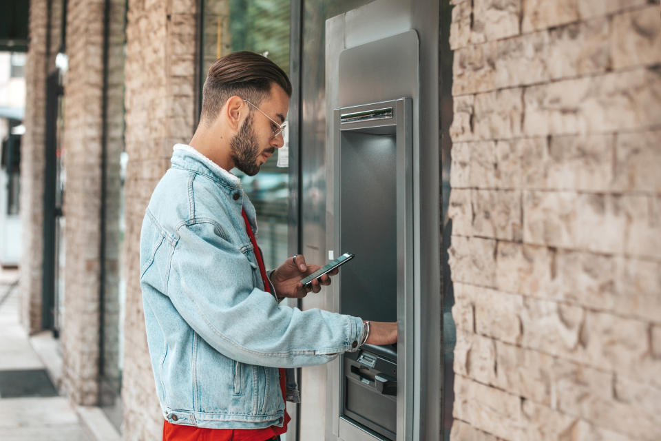 Man using an ATM