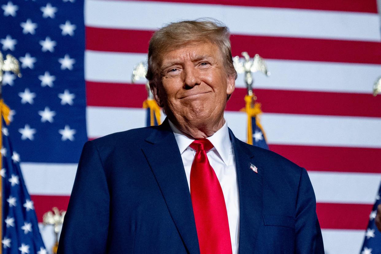 Republican presidential candidate former President Donald Trump appears at a caucus night party in Des Moines, Iowa, Monday, Jan. 15, 2024. (AP Photo/Andrew Harnik)