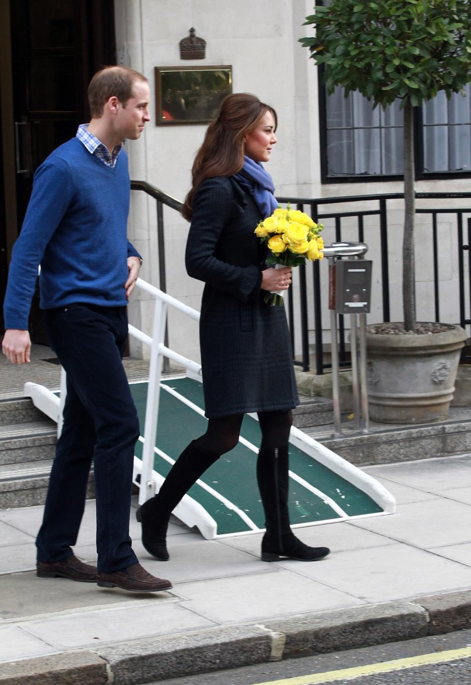 LONDON, ENGLAND - DECEMBER 06: The Duchess of Cambridge, Catherine Middleton and Prince William, Duke of Cambridge leave the King Edward VII hospital where she has been treated for hyperemesis gravidarum, extreme morning sickness at King Edward VII Hospital on December 6, 2012 in London, England. (Photo by Fred Duval/Getty Images)