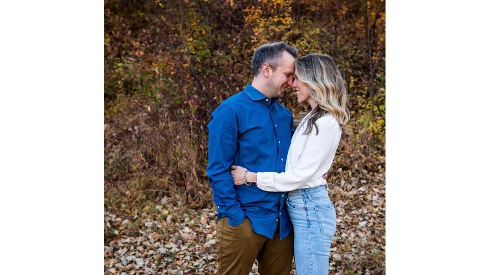 man and woman kissing in the outside