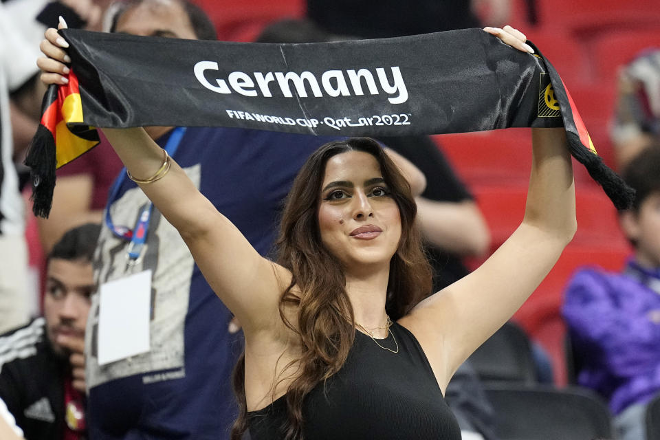 A German soccer supporter cheers before the World Cup group E soccer match between Costa Rica and Germany at the Al Bayt Stadium in Al Khor , Qatar, Thursday, Dec. 1, 2022. (AP Photo/Martin Meissner)