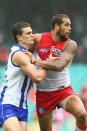 Pantsed: Scott Thompson go the better of Lance Franklin, keeping him to just one behind