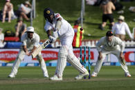 Sri Lanka's Kasun Rajitha plays at the ball while batting during play on day one of the first cricket test against New Zealand in Wellington, New Zealand, Saturday, Dec. 15, 2018. (AP Photo/Mark Baker)