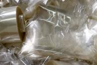 <p>This may not be the most environmentally friendly of pranks, but it sure makes a big impact. Use enough plastic wrap from industrial-size rolls to wrap your co-worker’s desk — or the entire cube — in the stuff. Or try it with gift wrap for a more festive look.</p>