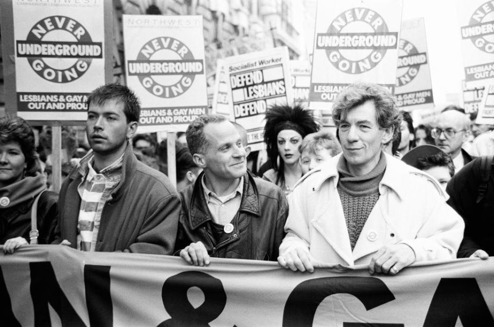 Young Sir Ian McKellen at a gay pride rally.