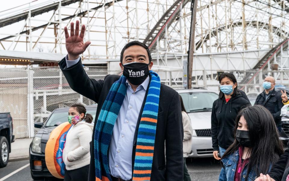 Mayoral candidate Andrew Yang and family visit Amusement Park on Coney Island, New York - Lev Radin/Pacific Press/Shutterstock 