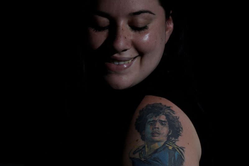 The Wider Image: Argentines celebrate 'eternal love' for Maradona with tattoos