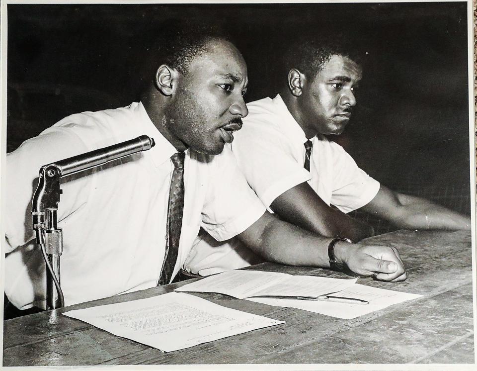 Civil rights leader Martin Luther King Jr., left, sits next to Dr. William Anderson, D.O., in a historical photo.