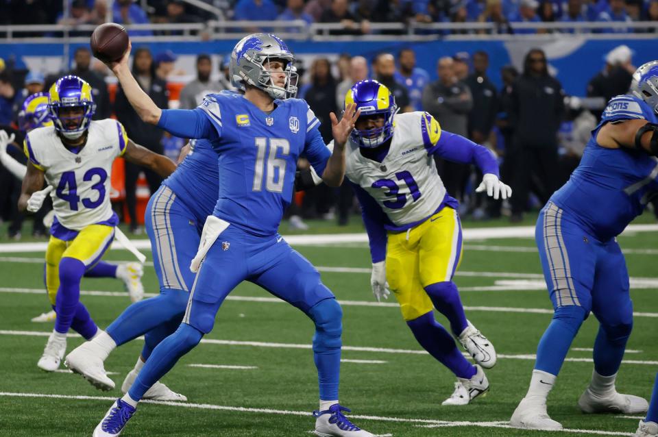 Detroit Lions quarterback Jared Goff looks to throw the ball during the first half the wild-card round of the NFC playoffs against the L.A. Rams at Ford Field in Detroit on Sunday, Jan. 14, 2023.