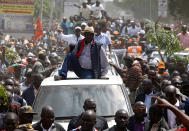 <p>Kenyan opposition leader Raila Odinga of the National Super Alliance (NASA) coalition is welcomed by his supporters upon his return in Nairobi, Kenya, Nov. 17, 2017. (Photo: Baz Ratner/Reuters) </p>