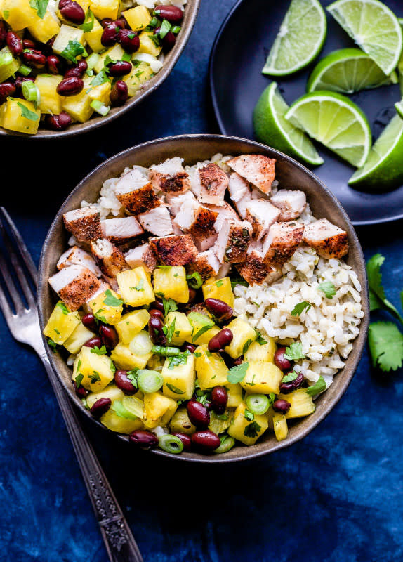 <p>Recipe Runner</p><p>Jerk chicken bowls with pineapple black bean salsa are a healthy dinner that also works great for meal prep! Coconut brown rice is topped with warmly spiced chicken and the most flavorful pineapple and black bean salsa.</p><p><strong>Get the recipe: <a href="https://reciperunner.com/jerk-chicken-bowls-with-pineapple-black-bean-salsa/" rel="nofollow noopener" target="_blank" data-ylk="slk:Jerk Chicken Bowls with Pineapple Black Bean Salsa;elm:context_link;itc:0;sec:content-canvas" class="link rapid-noclick-resp">Jerk Chicken Bowls with Pineapple Black Bean Salsa</a></strong></p>