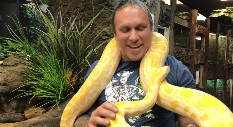 Brian Barczyk with Sunrise the snake at The Reptarium in 2018. Barczyk died Monday.