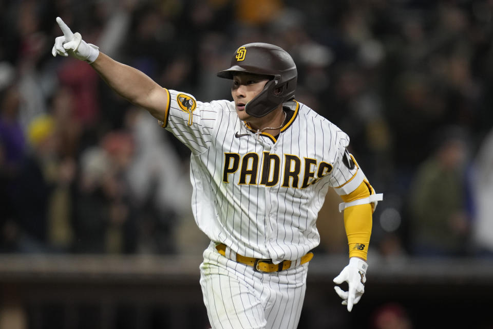 San Diego Padres' Ha-Seong Kim celebrates after hitting a walk-off home run during the ninth inning of a baseball game against the Arizona Diamondbacks, Monday, April 3, 2023, in San Diego. (AP Photo/Gregory Bull)