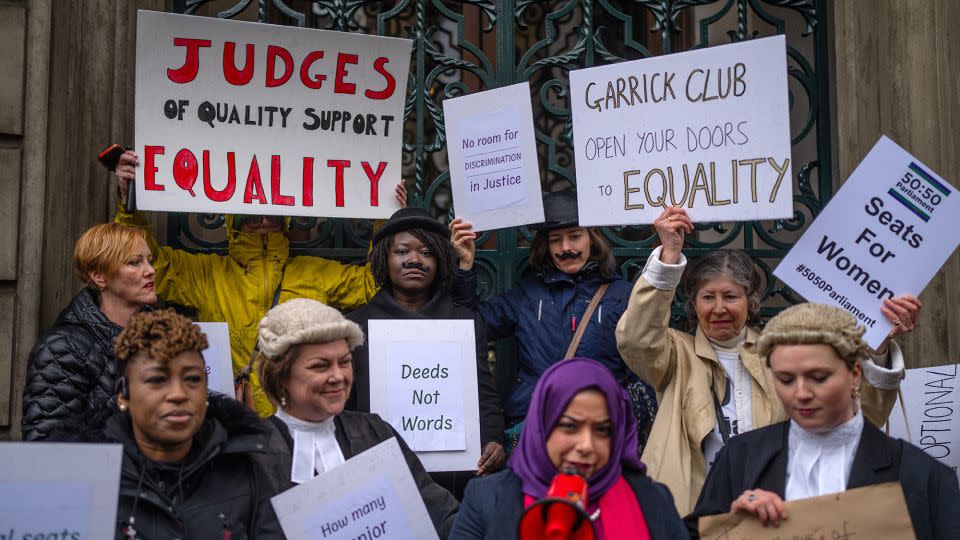 Protesters are pictured outside the Garrick Club on March 28. - Carl Court/Getty Images
