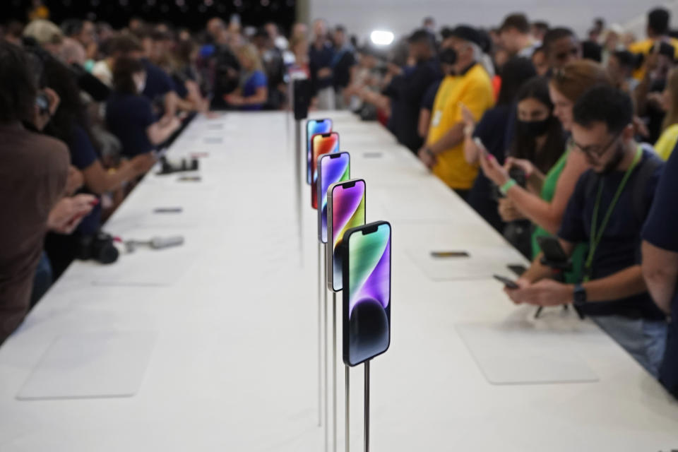 New iPhone 14 models are on display at an Apple event on the campus of Apple's headquarters in Cupertino, Calif., Wednesday, Sept. 7, 2022. (AP Photo/Jeff Chiu)