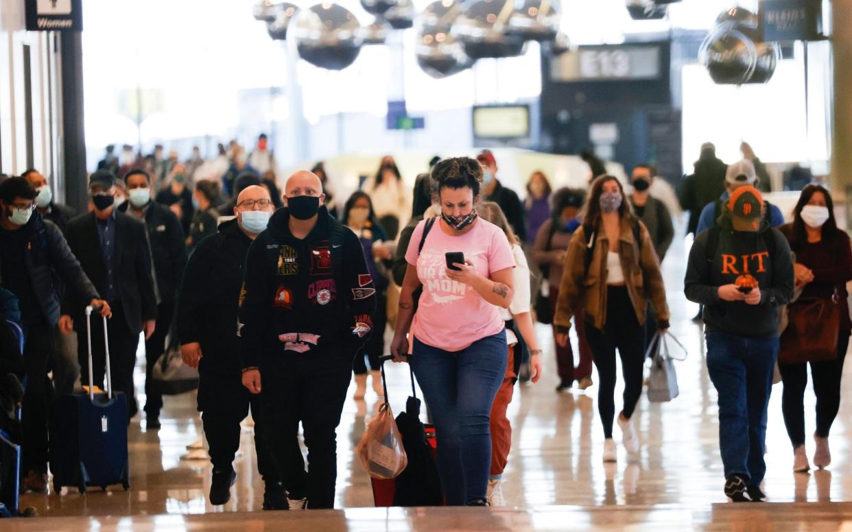 Passengers arrive at a United gate at San Francisco International Airport (SFO) in San Francisco - EPA