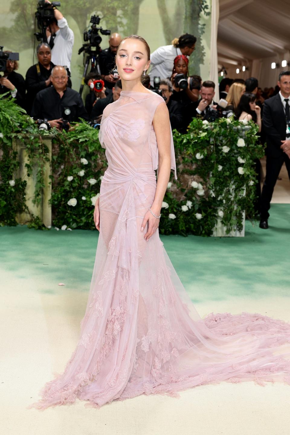 Phoebe Dynevor attends The 2024 Met Gala in a custom design by Victoria Beckham (Getty Images for The Met Museum)