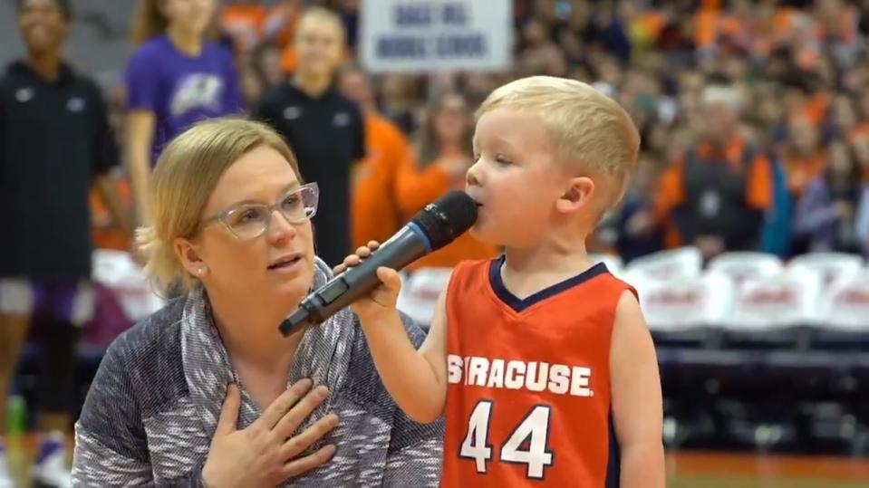 Drake Winslow sings the national anthem before a Syracuse Orange game on School Day.