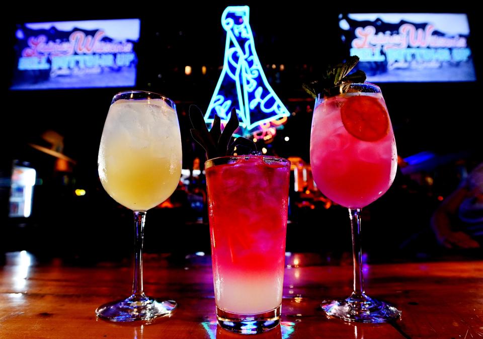 A Yellowstone Spritz, left, a Roadrunner, and a Dream Catcher cocktails at Lainey Wilson’s new Bell Bottoms Up Bar and restaurant on Thursday, May 30, 2024 in Nashville, Tenn.