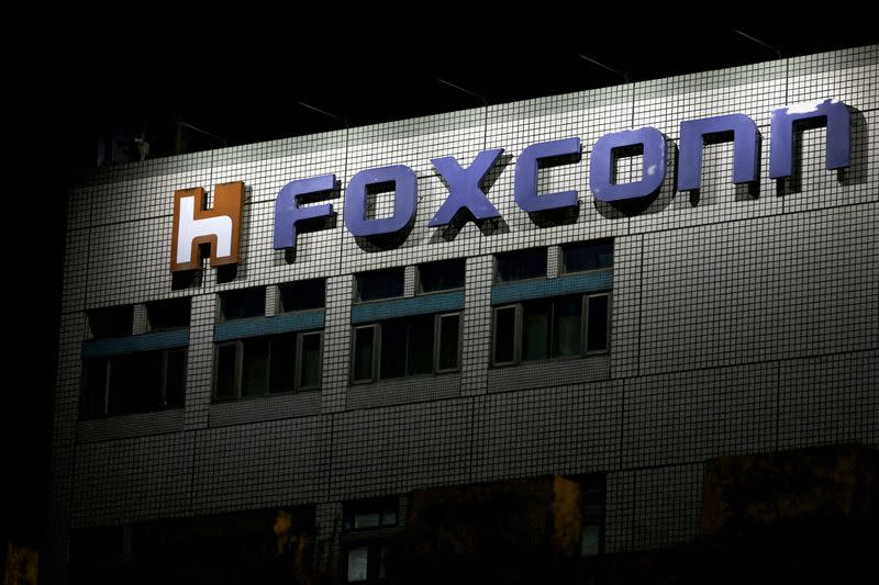 FILE PHOTO: FILE PHOTO: The logo of Foxconn is seen outside a company's building in Taipei