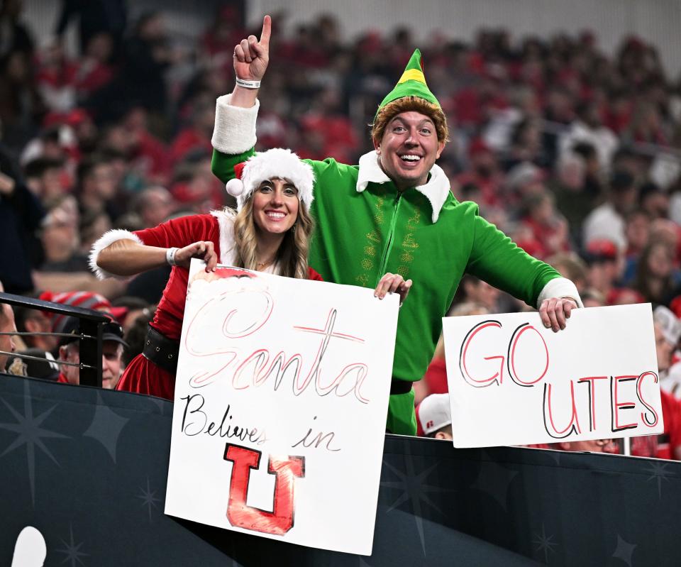 Reggie Russell and Scott Nielson pose for a photo before Utah and Northwestern playing in the SRS Distribution Las Vegas Bowl on Saturday, Dec. 23, 2023. | Scott G Winterton, Deseret News