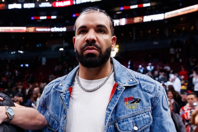 Rapper Drake leaves the court after the NBA In-Season Tournament game between the Toronto Raptors and the Boston Celtics  at Scotiabank Arena on November 17, 2023 in Toronto, Canada. NOTE TO USER: User expressly acknowledges and agrees that, by downloading and or using this photograph, User is consenting to the terms and conditions of the Getty Images License Agreement.  - Credit: Cole Burston/Getty Images