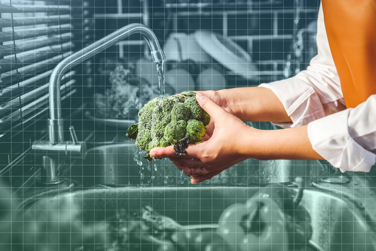 woman washing broccoli